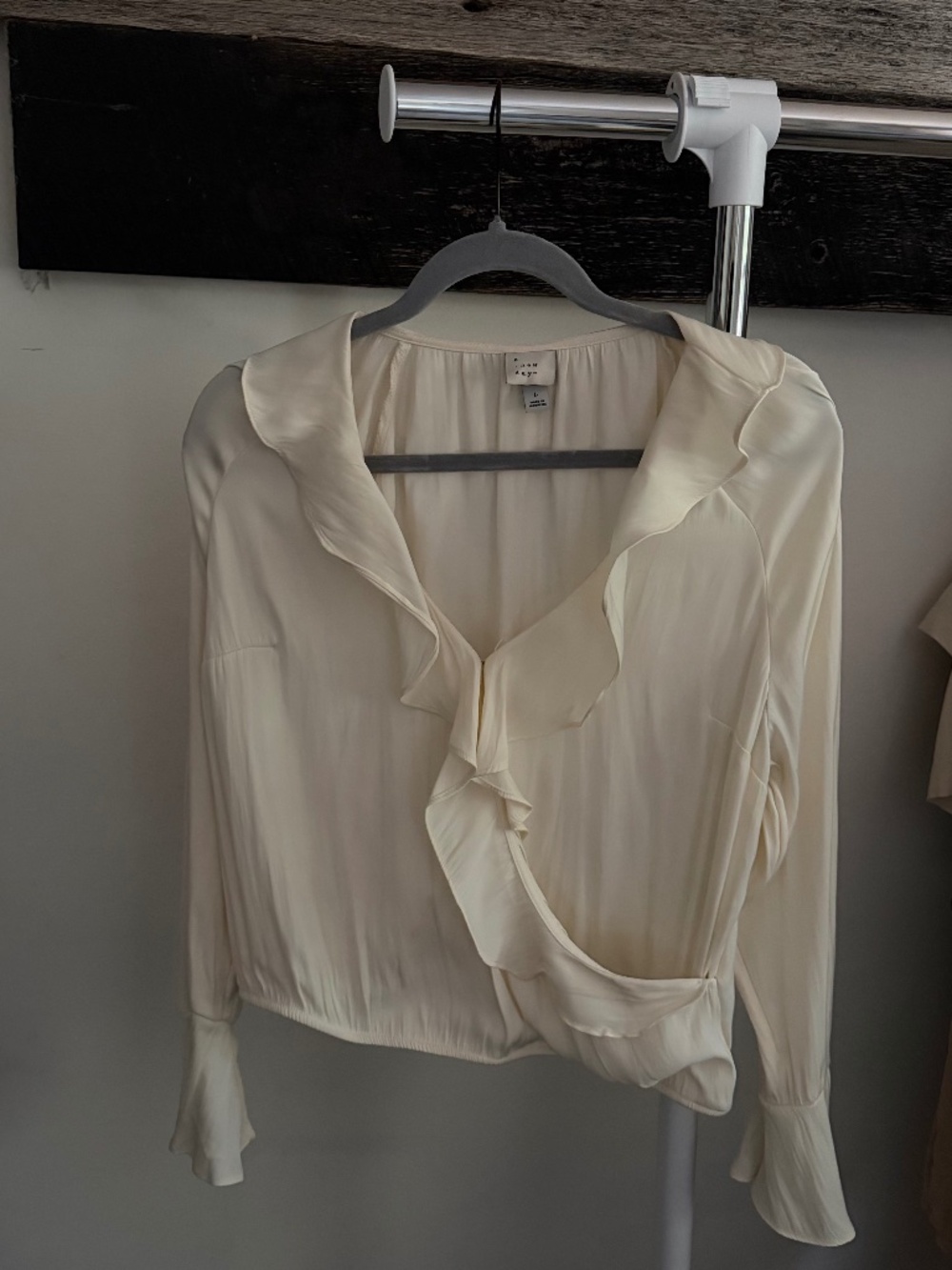 A New Day Ivory Satin Ruffle Wrap Blouse – Size Large